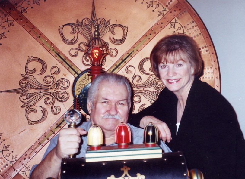 Bob and Kathy Burns, sitting in their refurbished original prop of THE TIME MACHINE from the 1960 movie starring Rod Taylor